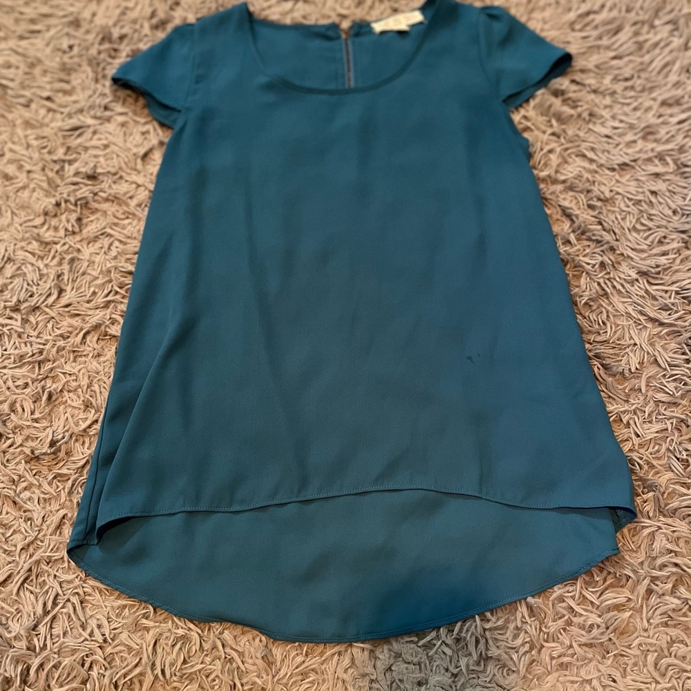 Blue cap sleeve blouse. Worn a few times.
